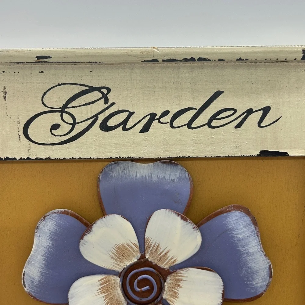 Sculpted Metal Flower Wall Hanging With a Rustic Wooden Frame Size 12x12 inches.